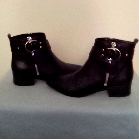 Nine West Shoes - A Pair Of  Black Boots.